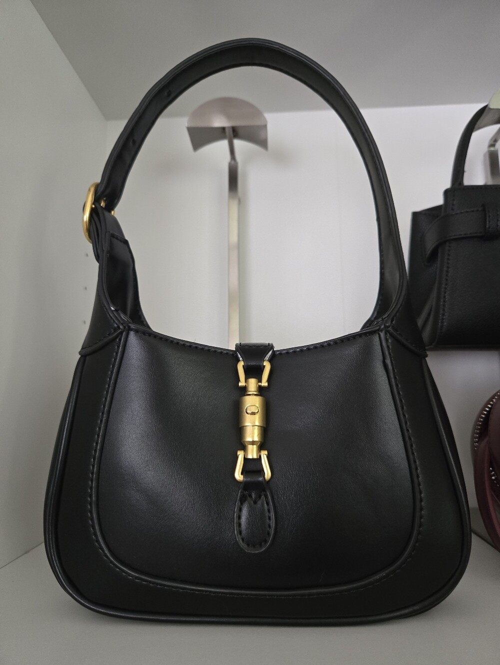 Black Leather Shoulder Bag with Gold Hardware